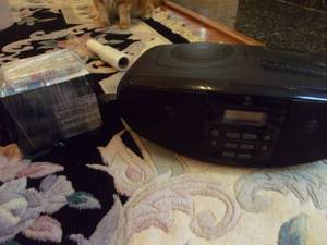 lot 29 image: Vintage Radio (Tested, Works) and Cassette Tapes of Various Artists.  See Discription