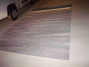 lot 16 image: Area Rug, Appears Unused,  Neutral Colors Tans, beige, light Blue