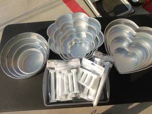 lot 27 image: Wilton Cake Pan Sets, For Multiple Occasions.  Rectangle Cake Pan and Pillars for Tier Cakes