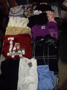 lot 119 image: Womans Blouses and Tops in style and colors as shown Sizes Large to XL