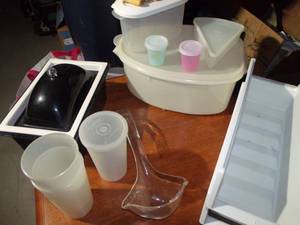 lot 110 image: Various Kitchen Items Including Tupperware Honey Ham Container with Lift Tray, Individual Pie Slice Container, 2 Sauce Containers, Serving Dish for Cold Item with Lid, Dish and Ice Container