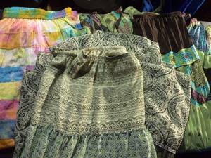 lot 128 image: Womens Skirts and two dresses in styles and colors as shown XL (1416)