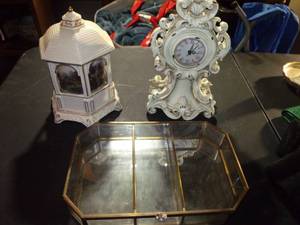 lot 134 image: Home Decor Thomas Kincade Music Box, Ornate Clock, and Glass Display Box with mirrored bottom