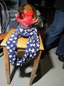 lot 297 image: Small Wooden Accent Table, approximately 12x12x36, Water Globe with Red rose inside, and Blue and White Star Infinity Scarf
