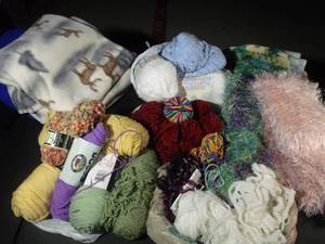 lot 228 image: Generous Amount of Yarn and Yards of Material in various colors, brands, and textures and