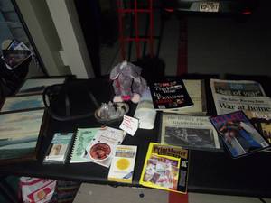 lot 290 image: Large Misc Lot, Home Decor Pictures, Magazines and Papers about 911, Cell Phone Batteries, Table top fountain, diet books