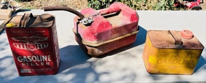 lot 29 image: Three Vintage Gas Cans- Eagle Gas Master XD Blitz 2 12 Gallon