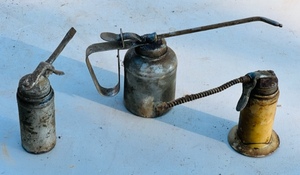 lot 95 image: Three Vintage Oil Squirters