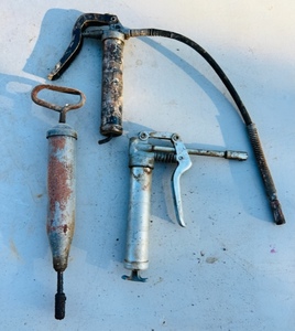 lot 96 image: Three Vintage Grease Guns