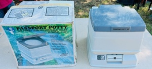 lot 149 image: Passport Potty Portable Toilet Model #6001