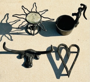 lot 197 image: Four Pieces of Vintage Cast Iron HomeFarm Indoor-Outdoor Decor