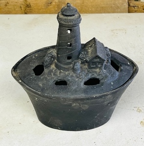 lot 229 image: Vintage Cast Iron Lighthouse Ashtray
