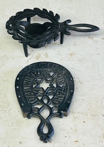 lot 243 image: Vintage Wilton Cast Iron Metal Footed Trivet Sad Iron Good Luck Horseshoe &amp&nbsp Star W Cast Iron Candle Footed Holder
