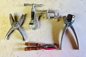 lot 256 image: Antique 1914 Perfection Table Mount Nut Cracker W 3 Other Vintage Nutcrackers