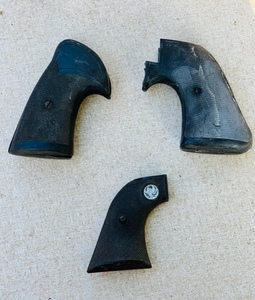 lot 388 image: Three Assorted Vintage Pistol Grips