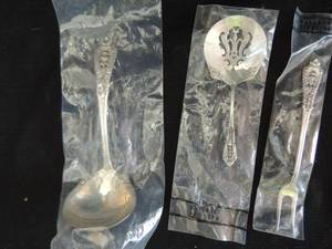 lot 394 image: WALLACE STERLING SILVER - ROSE POINT - CRANBERRYTOMATO SERVER  7 58  WT 26GMS  LADEL 6 14  WT 64 GMS  PICKLEOLIVE FORK 5 12  18 GMS
