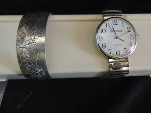 lot 396 image: SILVER CUFF BRACELET  MARKED 900-2  WT 42 GMS  GENEVA WATCH