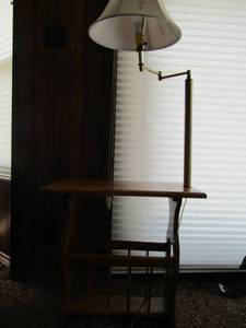 lot 17 image: Brown shelf floor lamp has bottom storage for books or magazines, heart shapes on table ends 251420