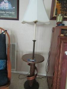 lot 36 image: Marble floor lamp table with shade works has a wrap around wooden piece at the bottom  57 X 15