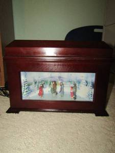 lot 55 image: Mr. Christmas Animated music box with 16 disk like new