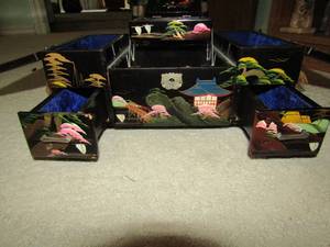 lot 54 image: Japanese painted jewelry box, 2 drawers, 2 swinging doors, also has a music box mirror is slightly broken