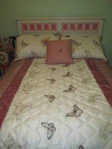 lot 61 image: Full size bed white and pink headboard with metal bed railing very nice