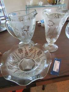 lot 78 image: Rose clear glass 9 12  bowl, 9 handled water Pitcher , 9 flower vase. All match same design