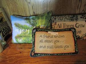 lot 84 image: 3  throw pillows, sayings are -  life grows with God- A friend knows- Enjoy life