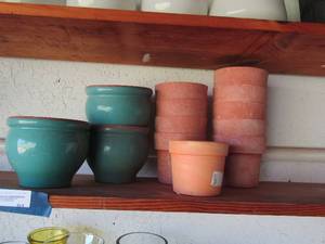 lot 91 image: 13 outdoor pot planters teal  and brown