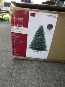 lot 93 image: 6 12 ft holiday living Christmas tree in original box. Pre lite Seneca pine tree