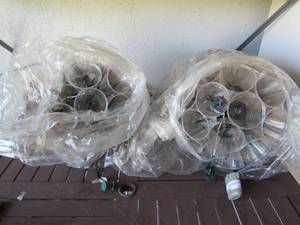 lot 101 image: 2 handmade  Christmas chandeliers made with lights and clear plastic cups.  VINTAGE