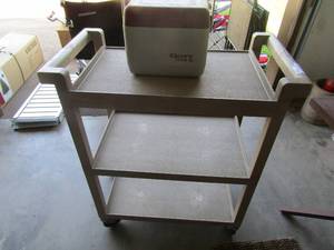 lot 105 image: DBL handles rolling work shop cart plastic 3 tier shelving,   GOTE Tote lunch chest