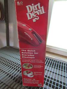 lot 107 image: 6.0 volt dirt devil hand held vacuum, used comes in original box