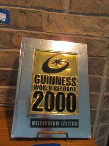 lot 134 image: Guinness world records book year of 2000, Millennium Edition