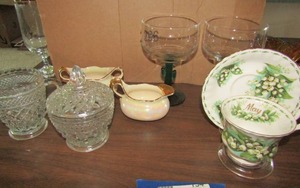 lot 157 image: crystal cream and sugar dish, 2 dessert margarita glasses, Royal Albert cupsaucer, pearl white creamer and  sugar