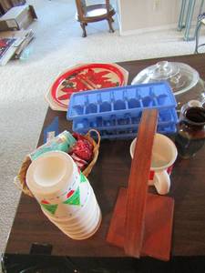 lot 185 image: Christmas serving platters plastic, ice treys, plastic kids cups, banana hanger, misc. lids,
