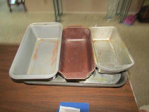 lot 191 image: Lot of metal bread pans, muffin pans,  baking dishes