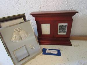 lot 209 image: 25th anniversary photo frame, sliding photo frame, 810 photo frame