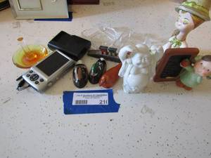 lot 210 image: Canon power shot camera, home dcor nick nacks 3 lil ducks, 2 clear glass ash treys