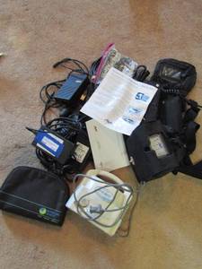 lot 218 image: Portable Oxygen concentrator with extra battery and caring case, unknown working condition, has 2 power cords,    & a Deibkiss nebulizer, TENS unit