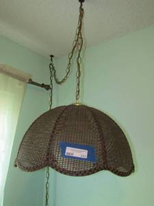 lot 237 image: Hanging wicker shade lamp, works good condition brown in color NO GLOBE