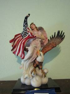 lot 239 image: DeCapoli collection  - Statue of Angel with eagle and American flag, beautiful piece, 1713