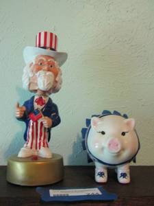 lot 244 image: American porcelain pig, Uncle Sam statue 10 tall