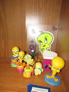 lot 259 image: bird lot, reading a book in chair, baby  TWEETY  sticky notes, picture