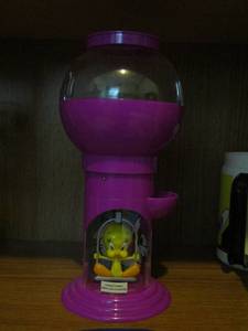 lot 261 image: Purple  TWEETY bubble gum machine, empty,