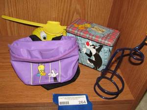 lot 264 image: TWEETY waist bag, straw, 2 ten cans hanger