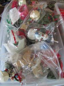 lot 283 image: Clear tote full of Christmas dcor, tree dcor, house dcor all very nice, individually wrapped
