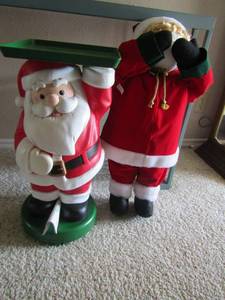lot 291 image: 25 lady santa Doll,   22 Mr.. Christmas serving Santa no remote found, takes batteries