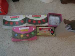 lot 297 image: Box of 10 Poinsettias lighted, 3 boxes of Illumunated Garland,