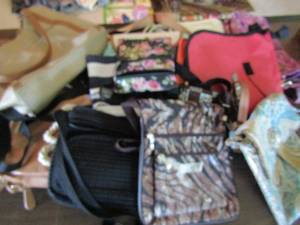 lot 299 image: Large lot of womens small hand bags and purses